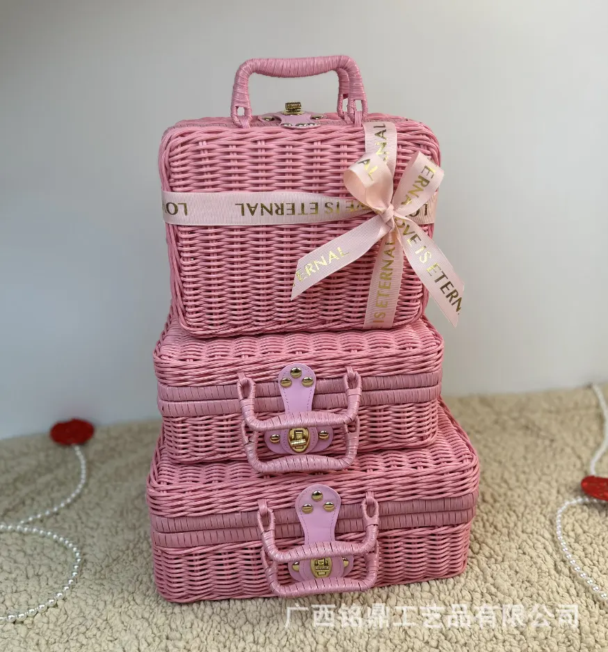 Rounded Rectangular Gift Case Set — Rounded rectangular gift cases with short handles, front clasps and decorative trim, shown as a coordinated family of sizes.