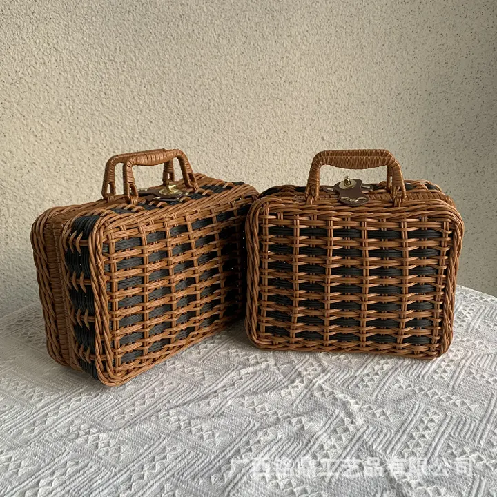 Contrast-Weave Lidded Carry Case — Rectangular lidded carry case with contrasting woven bands, a top handle and front clasp, shown in coordinated color treatments.