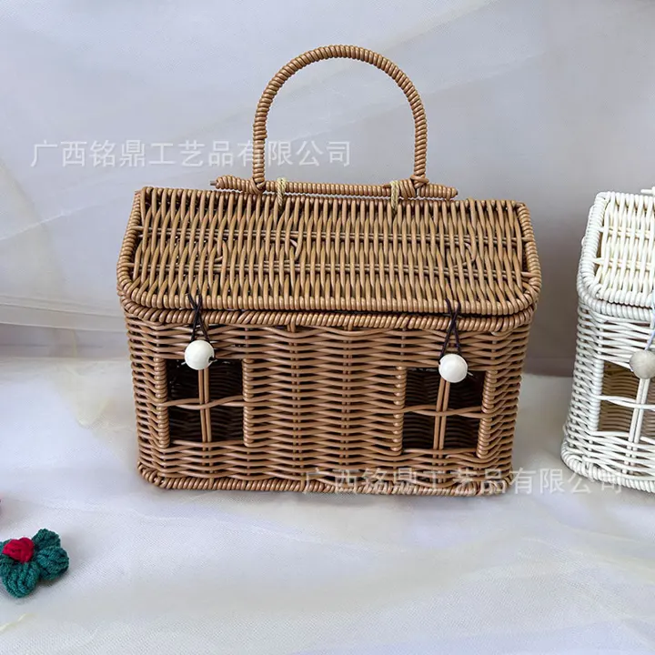 House-Shaped Decorative Gift Basket — House-shaped basket with a roofline profile, top handle, front openings and decorative trim for themed gifting and display.