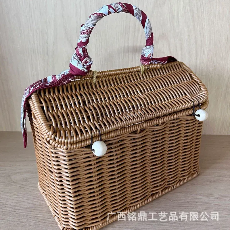 House-shaped basket with a fabric-wrapped handle