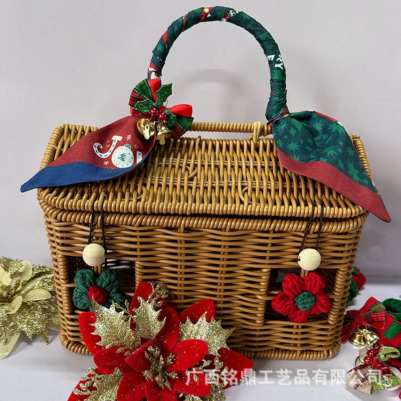 A brown house-shaped woven basket with a red-and-green fabric-wrapped handle, festive bow and crocheted flower decorations.